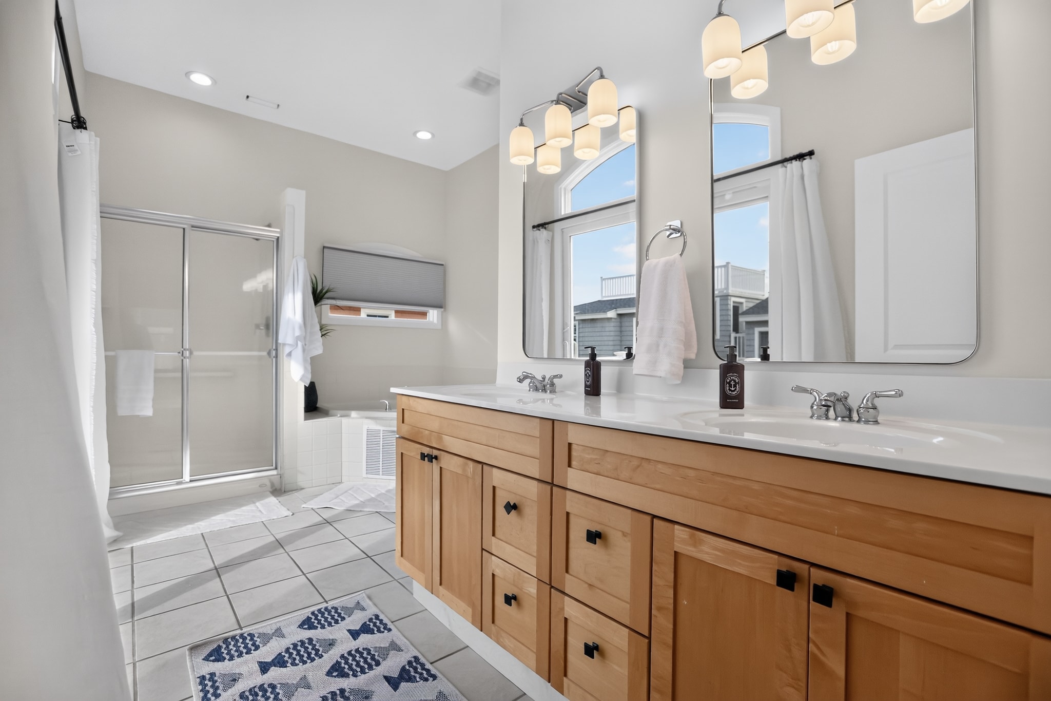 Master bathroom with double vanity, soaking tub and walk-in shower